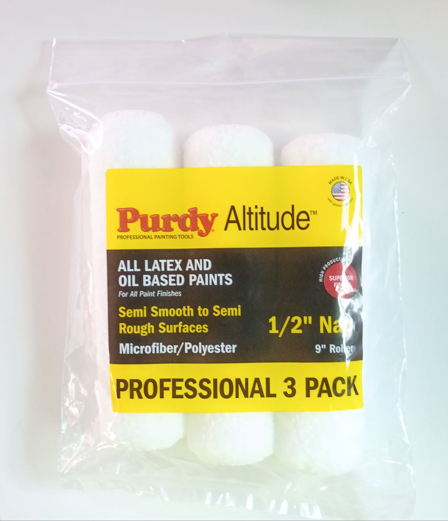 A 3-pack of Purdy Altitude 1/2" Navy microfiber roller cups in a clear plastic bag with a yellow and black label, photographed on a white background.