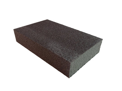 A rectangular dark gray abrasive sanding block with a coarse, textured surface, shown on a white background.