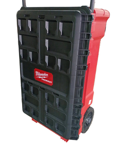 A black and red Milwaukee rolling tool box sitting upright on it's wheels. Shown on a white background.