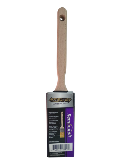 A Rembrand handcrafted paint brush with a light wood handle and a black and purple product label, shown against a white background.