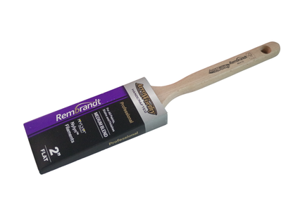 A 2-inch Arroworthy Rembrandt flat paint brush featuring a purple, black, and silver package with a natural wood handle, shown on a white background.