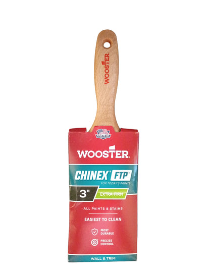 A 3-inch wooden paint brush with a red and teal Wooster Chinex-FTP handle wrap, shown against a dark gray textured background.